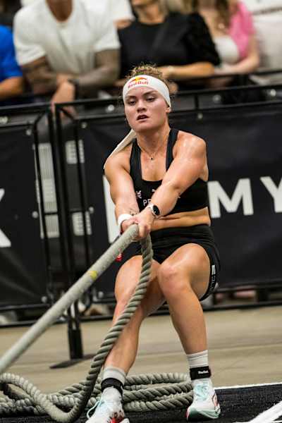 Lucy Procter showcases her strength pulling ropes at the HYROX World Championship in Chicago.