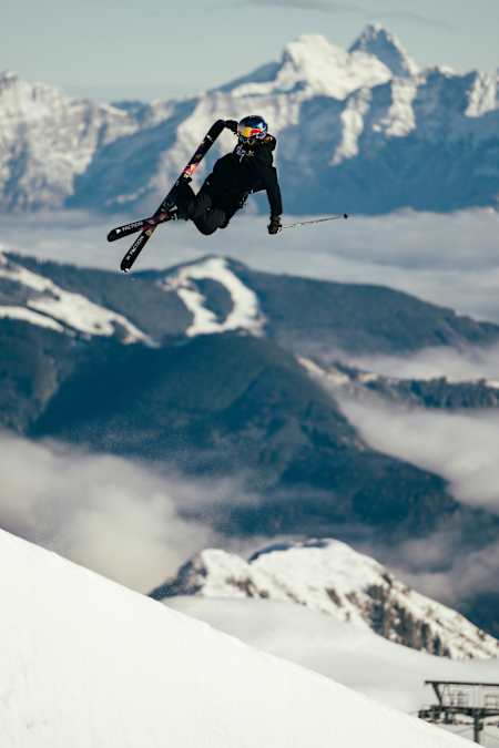 Eileen Gu flies high above the half pipe at Kitzsteinhorn, Austria during a skiing session in November 2023.