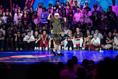 In 2024, MT Pop graces Red Bull's Dance Your Style World Final stage in Mumbai with colourful moves.