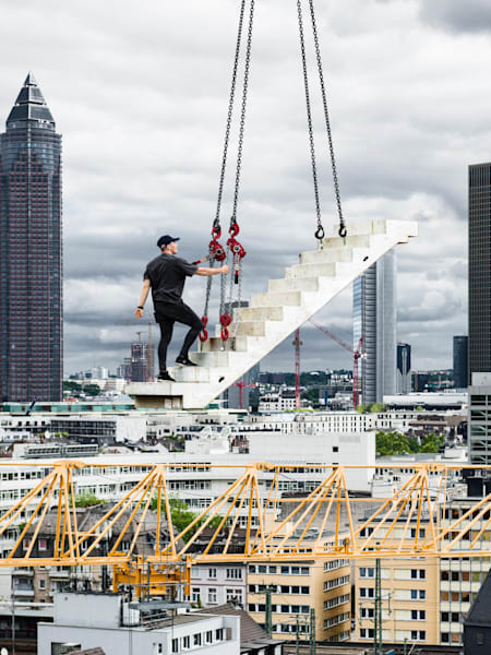 Jason Paul on a staircase that hovers 30 metres above Frankfurt.