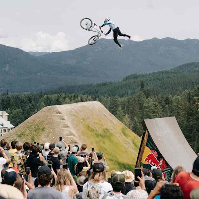Dawid Godziek soars over ramp at Red Bull Joyride 2024 event in Whistler with an awe-inspiring mountain bike stunt