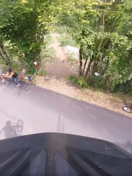 Watch the insane moment a MTB rider jumped over the Tour de France