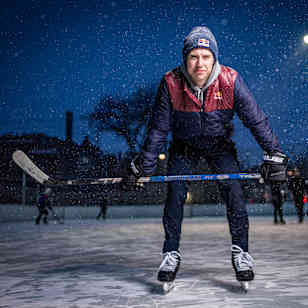 Mitch Marner on an outdoor rink at night while it snows