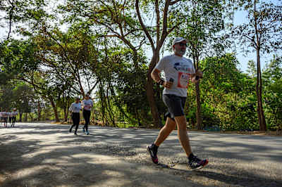 Runners participate in Wings for Life World Run at Aarey Colony in Mumbai.