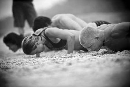 Mick Fanning training on the beach