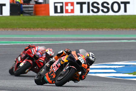 Miguel Oliveira leads Jack Miller during the MotoGP of Thailand on October 2, 2022.