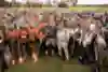 Grylls and Mark Burnett pose with all of the Eco-Challenge racers.