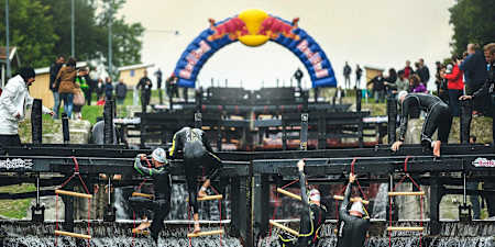 Swimmers climb up the locks during Neptune Steps