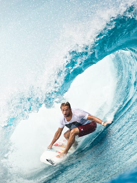Dylan Longbottom surfing at Teahupo'o, Tahiti in a photograph shot by Michael Clark.