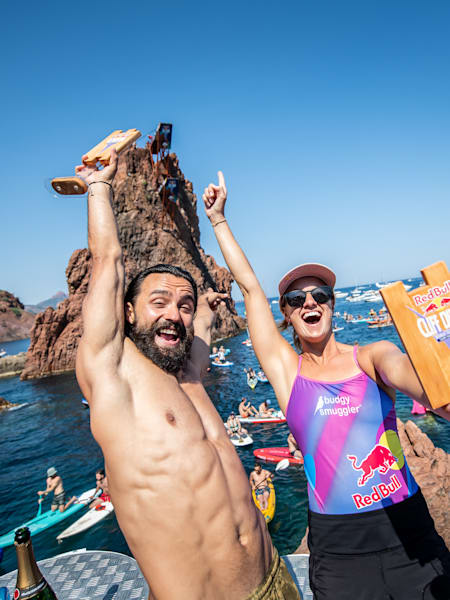 Catalin Preda of Romania and Rhiannan Iffland of Australia celebrate after winning the first stop of the Red Bull Cliff Diving World Series in Saint Raphael, France on June 12, 2021.