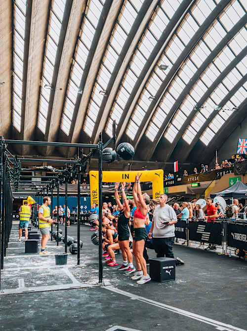 Participants perform at the Hyrox World Championship in Nice, France, on June 8, 2024.