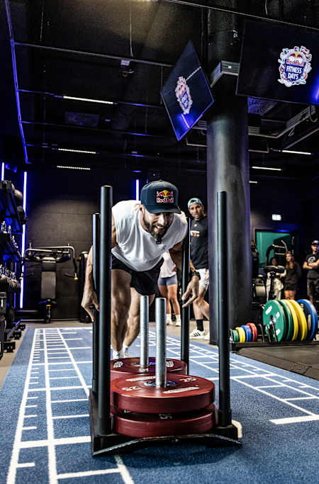 Alexander Rončević seen practising the sled push during training for HYROX competition.
