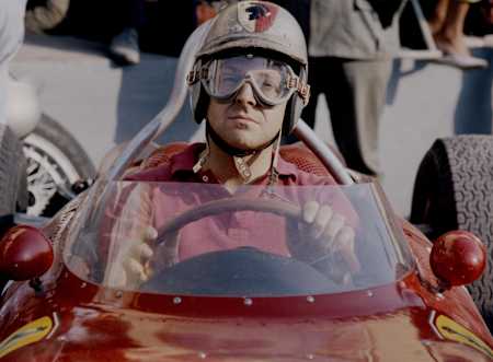 Wolfgang von Trips of Germany, driver of the #4 Scuderia Ferrari Ferrari 156 Ferrari V6 awaits the start of the Italian Grand Prix on 10 September 1961 at the A