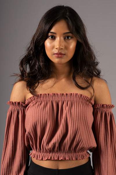 Meba Ofilia poses for a profile photo.