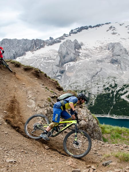 Mountain bikers Stefano Davarda and Alessandro Cagnasso performing in Val di Fassa, Italy on June 28, 2018.