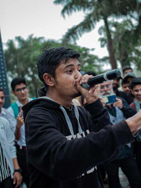 Indian beatboxer Karun Krishna performs for a crowd.