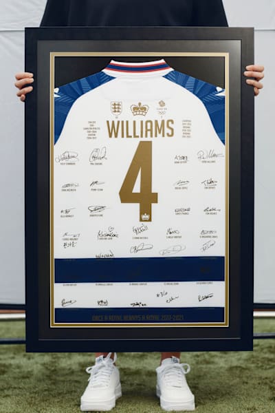 A signed Reading shirt, presented at Fara Williams' final match.