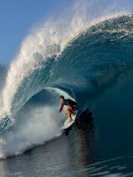 Jack Robinson testing the limits of his step-ups at Teahupo'o in Tahiti