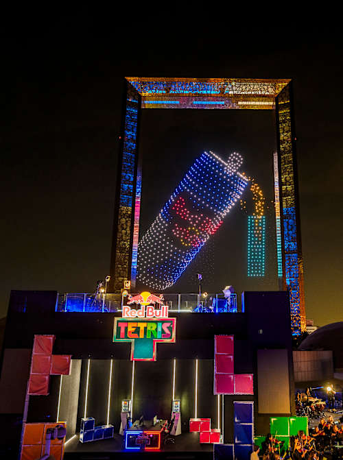 Dazzling drone display forms a Red Bull can above the Red Bull Tetris World Final stage in Dubai, UAE, on 13 December 2025, blending classic gaming energy with spectacular visuals.