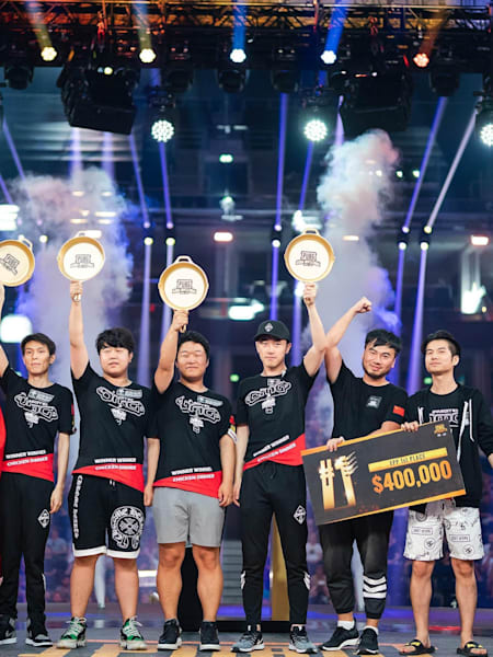 A picture of OMG on stage after winning the FPP tournament at PGI 2018