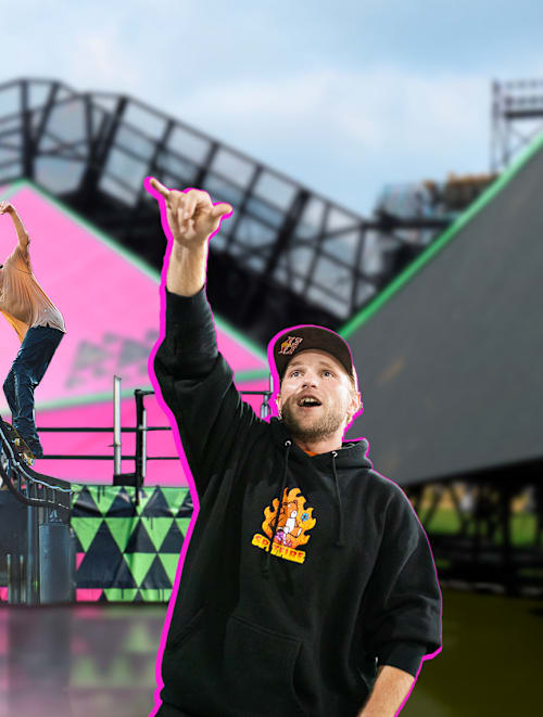 A man excitedly cheers while a skater performs a balance trick on a wavy rail on a colourful obstacle course for Kasso Fest Skate & Sound.