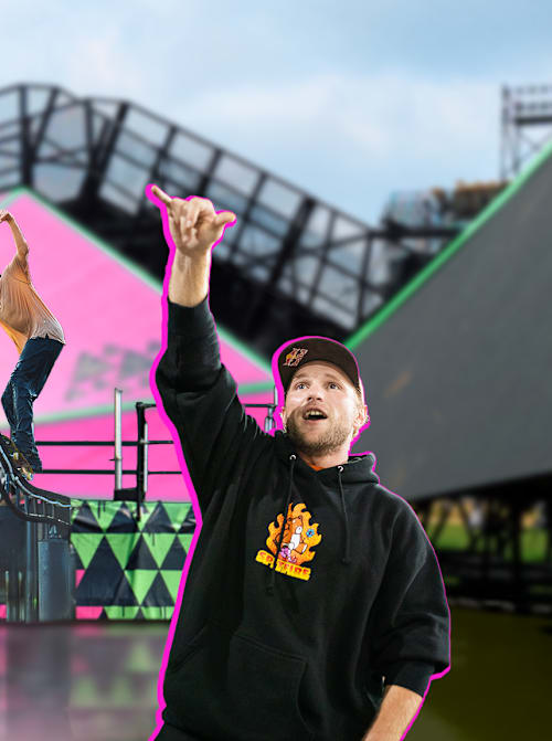 A man excitedly cheers while a skater performs a balance trick on a wavy rail on a colourful obstacle course for Kasso Fest Skate & Sound.