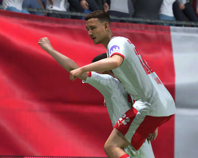 Two RB Leipzig players celebrate after scoring a goal in FC 26.