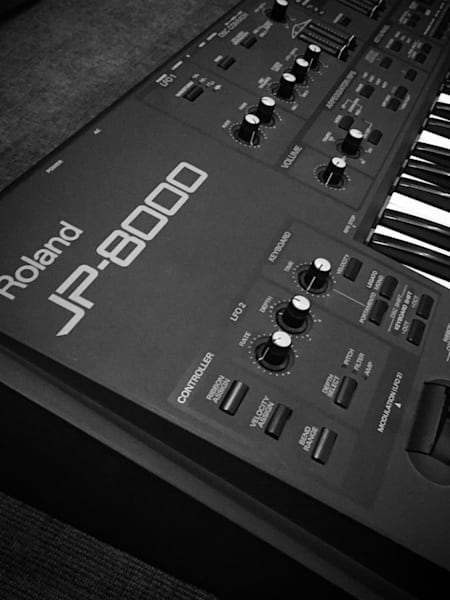A detail photo of a Roland JP-8000 electronic musical instrument.