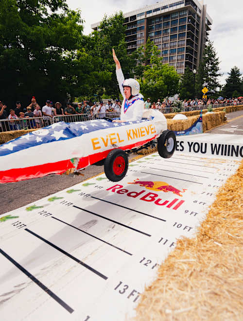 Participant hits a jump at Red Bull Soapbox Race in Salt Lake City, USA, on June 14, 2025