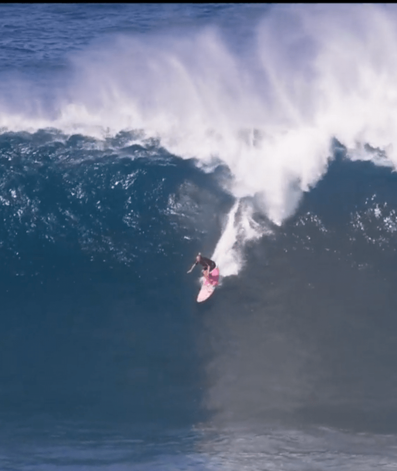 Big wave surfer Pedro Scooby from Brazil rides a wave during a tow surfing  session at Praia do Norte on the first big swell of winter season. (Photo  by Henrique Casinhas /