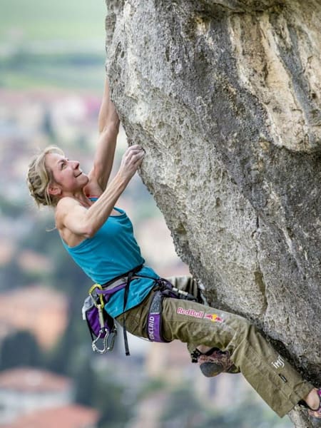 Angela Eiter free climbs over Arco, Italy