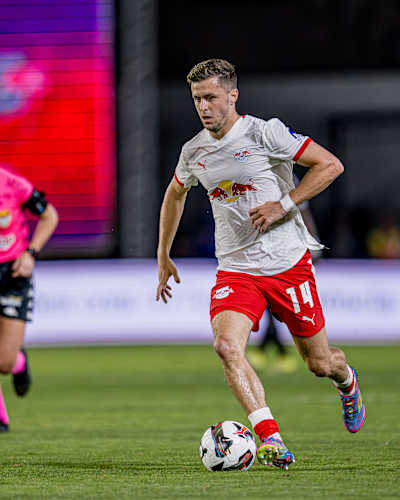 RB Leipzig's Christoph Baumgartner drives the ball during the 2025 test match against FC Santos at Estádio Municipal Cícero de Souza Marques in Braganca, Brazil