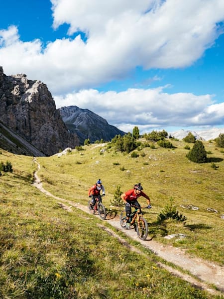 Claudio Caluori and Danny MacAskill ride among the mountains in Switzerland.