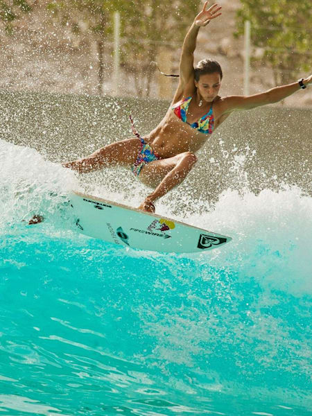 Australian surfer Sally Fitzgibbons surfing at the Wadi Adventure Wave Pool in Dubai.