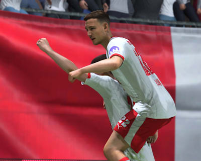 Les joueurs du RB Leipzig célébrent un but dans le jeu EA Sports FC 26.