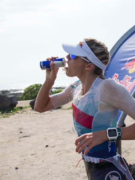 Lucy Charles-Barclay drinks a Red Bull during Ironman World Championships, Kona, Hawaii, 2017
