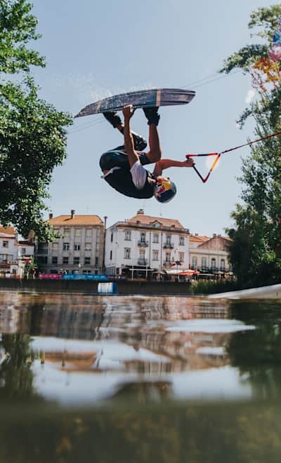 Guenther Oka of the USA jumps from a kicker during the first training day of the Tomar Pro Wakeboard 2019 in Tomar, Portugal on August 2, 2019.
