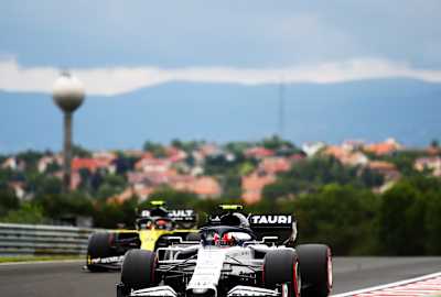 Renault F1 and AlphaTauri battle it out on the Hungaroring circuit, during the Hungarian Grand Prix, of the 2020 Formula 1 World Championship. 