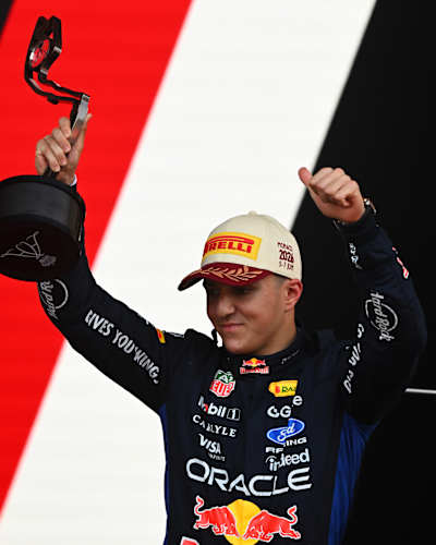 Third placed Isack Hadjar of France and Oracle Red Bull Racing on the podium with his trophy during the F1 Grand Prix of Monaco at Circuit de Monaco. 