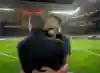 An image of RB Leipzig footballer Mohamed Simakan celebrating with coach Domenico Tedesco.