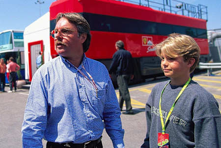 Nico Rosberg vaults from the car in celebration after winning the world championship at the 2016 Abu Dhabi Grand Prix.