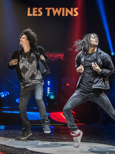 Dancers Les Twins, Laurent (R) and Larry (L) Bourgeois of France perform during Red Bull BC One World Finals at the Palazzo dei Congressi in Rome, Italy on November 14, 2015