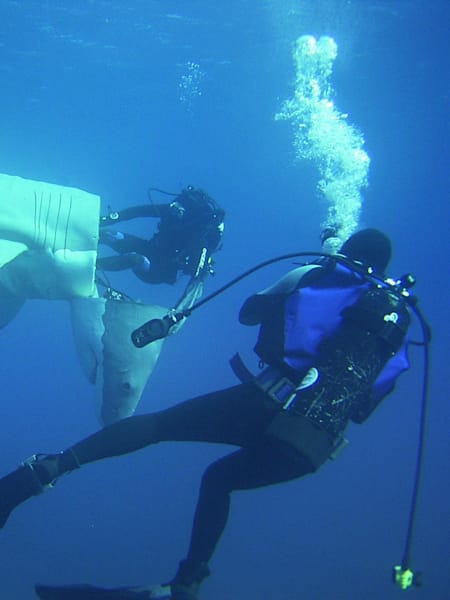 Fabien Cousteau getting out of a shark-shape submarine during the Troy project.