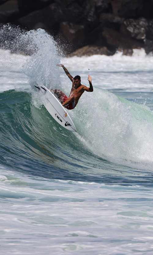 Kehu Butler surfs off the top at Duranbah Beach, Queensland, Australia on March 19, 2021.
