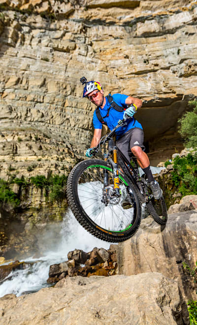 Kenny Belaey performs during filming Border to Border at Afqa waterfall, Lebanon on June 7, 2019.