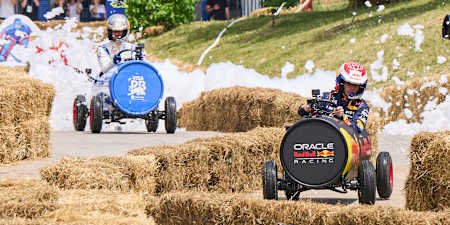 F1 drivers Max Verstappen and Daniel Ricciardo race soapbox cars ahead of the Grand Prix Montreal event
