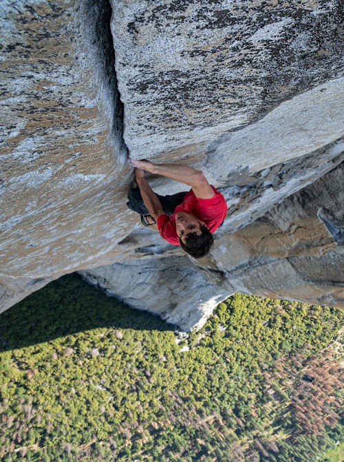 Alex Honnold makes his way up a rock face during Free Solo.