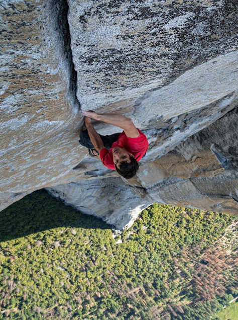 Alex Honnold makes his way up a rock face during Free Solo.