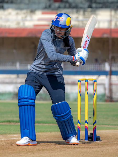 Indian women's cricket team opening batter Smriti Mandhana plays a shot.