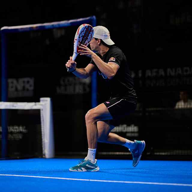 Red Bull athlete Juan Lebrón Chincoa in action at the Cancun Premier Padel P2 quarter-finals in Mexico on March 14, 2025, bringing unmatched energy to the vibrant blue court